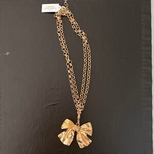 Park Lane Gold Ribbon Necklace- “sleighbell”